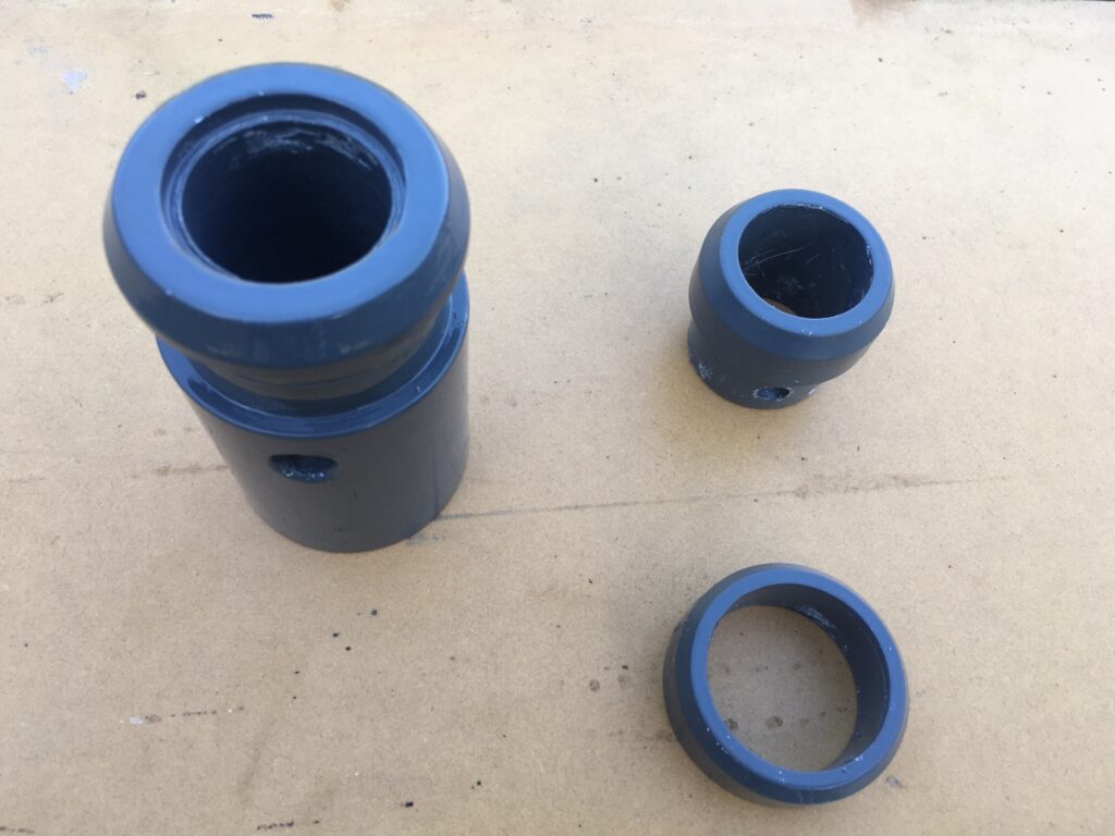 The plastic components coated with a plastic primer paint and a coat of grey Rustguard applied over the top.