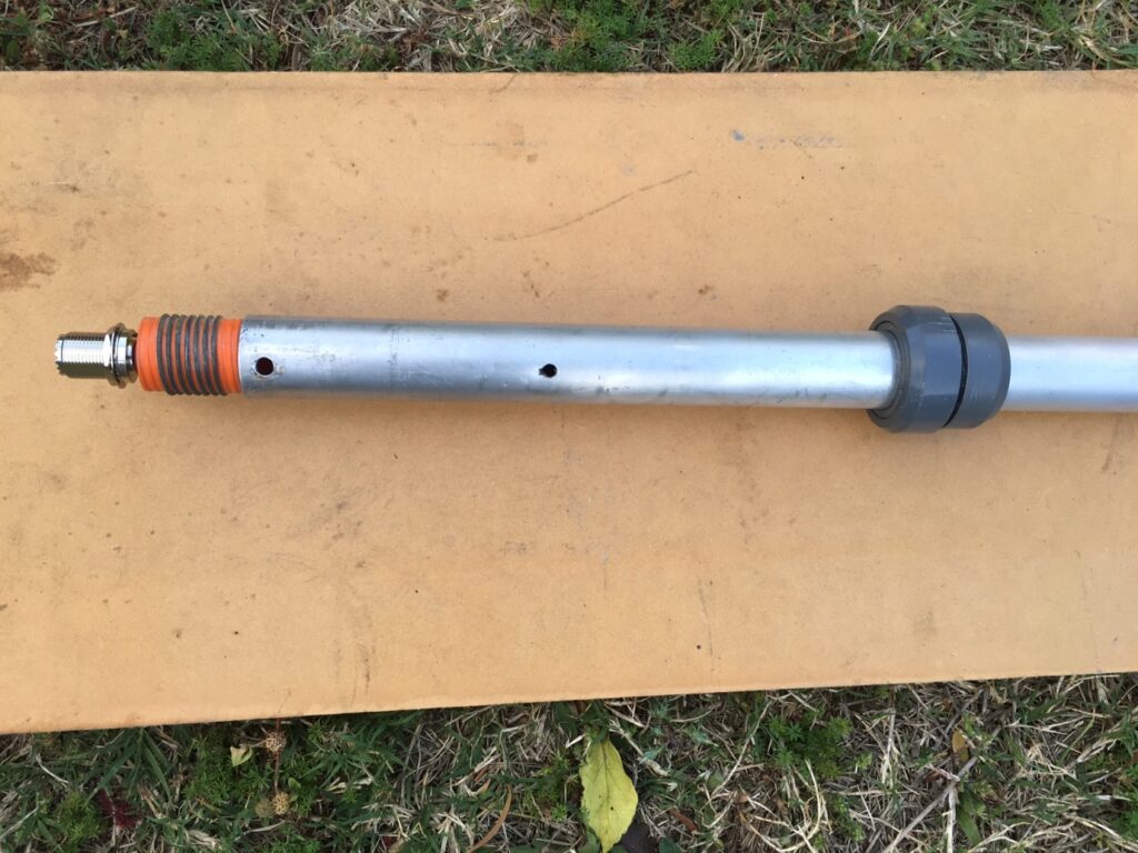 The auto-transformer assembly has been inserted back into the bottom tube and the rivet holes lined up. 